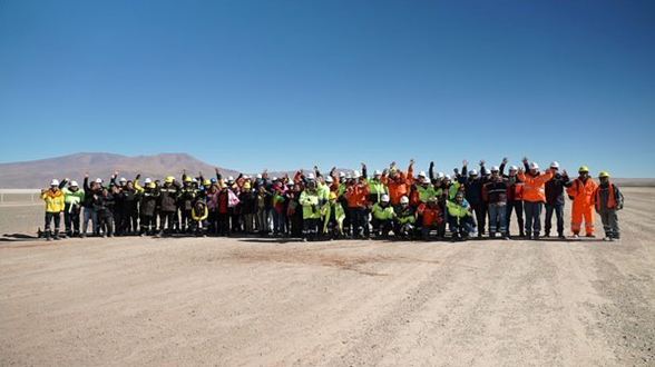 Group of Rio Tinto employees, community members, and contract partners at the new Rincon airstrip